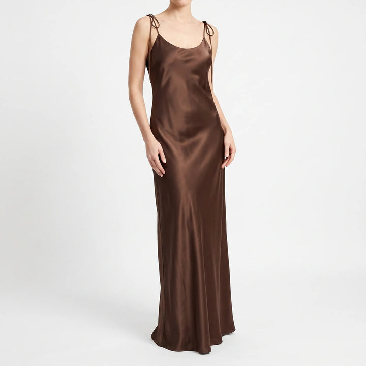 Flowing women's floor-length backless slip dress with a V-neck, offering effortless evening style.
