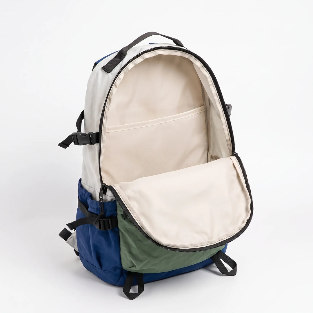 Ergonomic unisex hiking backpack, lightweight nylon daypack ideal for outdoor adventures & travel.