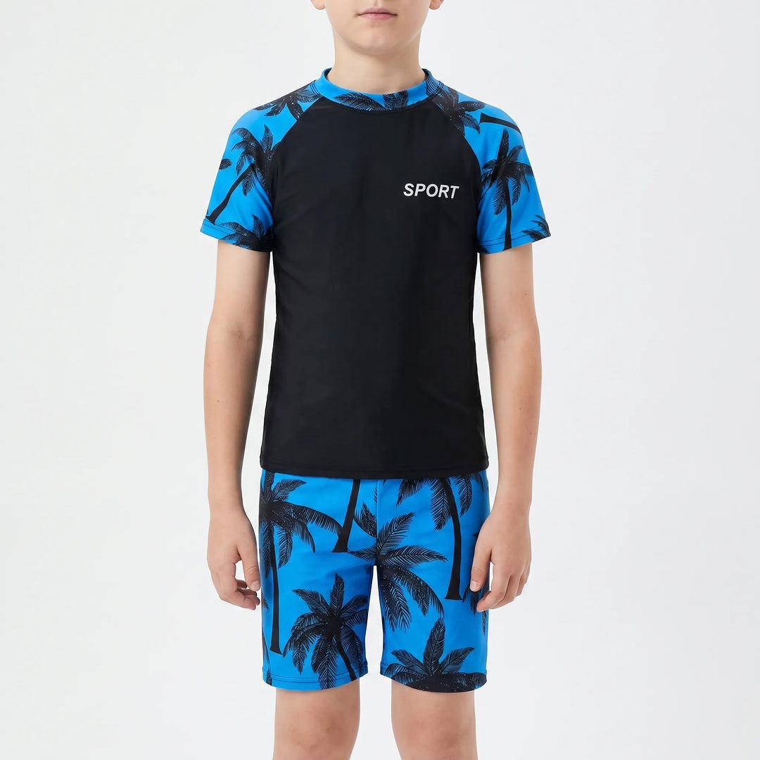 Active boys' two-piece swimsuit. Durable swim shorts & top for kids' summer water adventures & beach play.