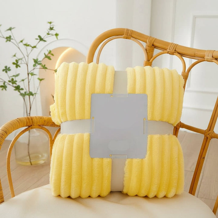 Unisex ultra-soft flannel fleece throw blanket, offering luxurious comfort and cozy warmth.