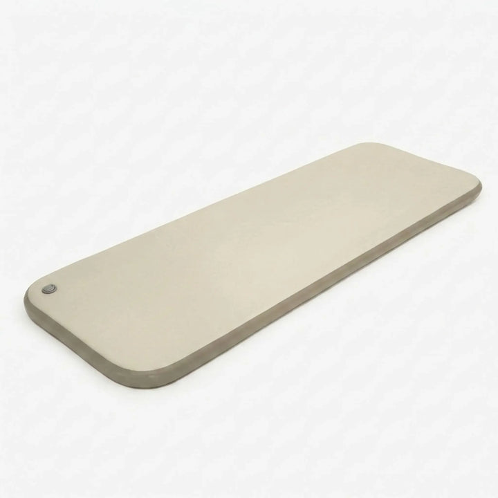 Comfortable inflatable sleep pad, a portable air mattress for camping, hiking, or as a guest bed.