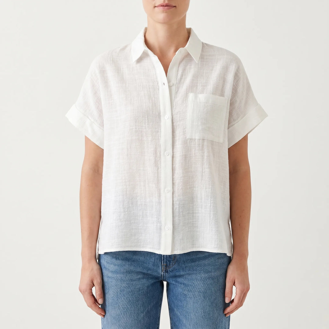Light & comfortable women's short sleeve button-down shirt. Versatile for casual summer fashion.