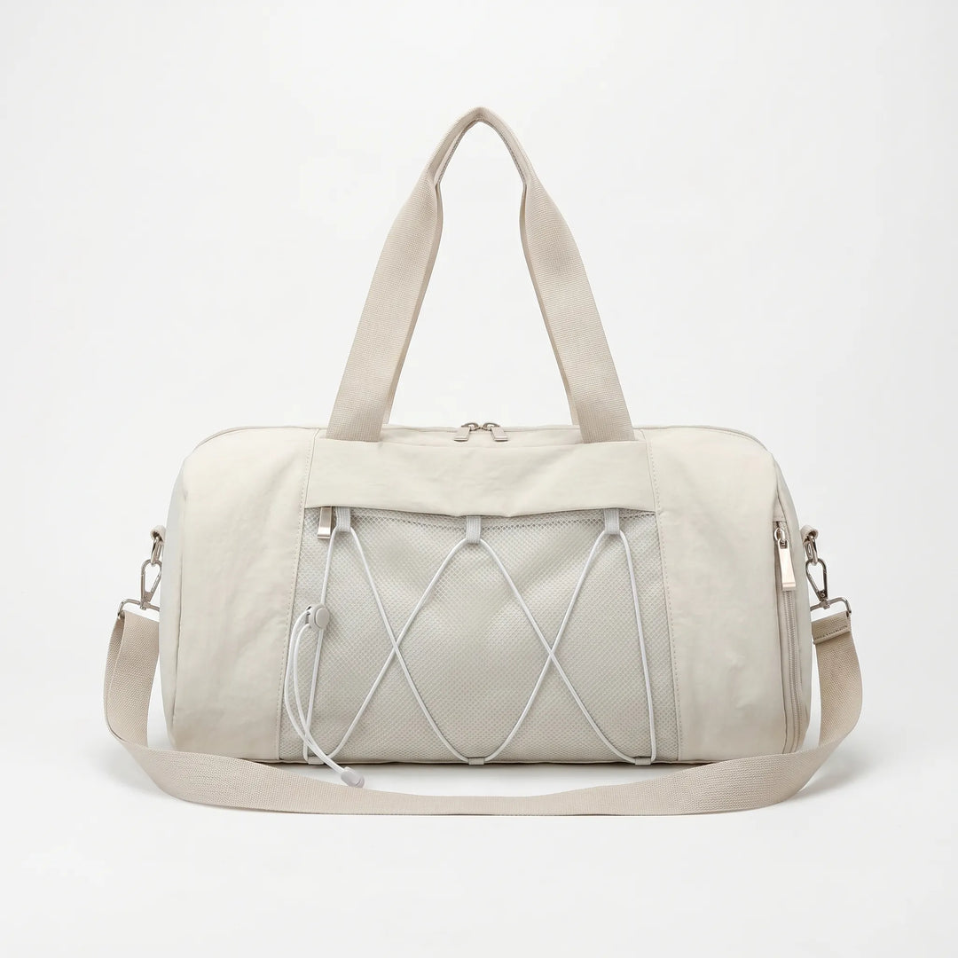 Durable nylon unisex duffel bag for gym, sports, and weekend travel. Perfect for activewear.