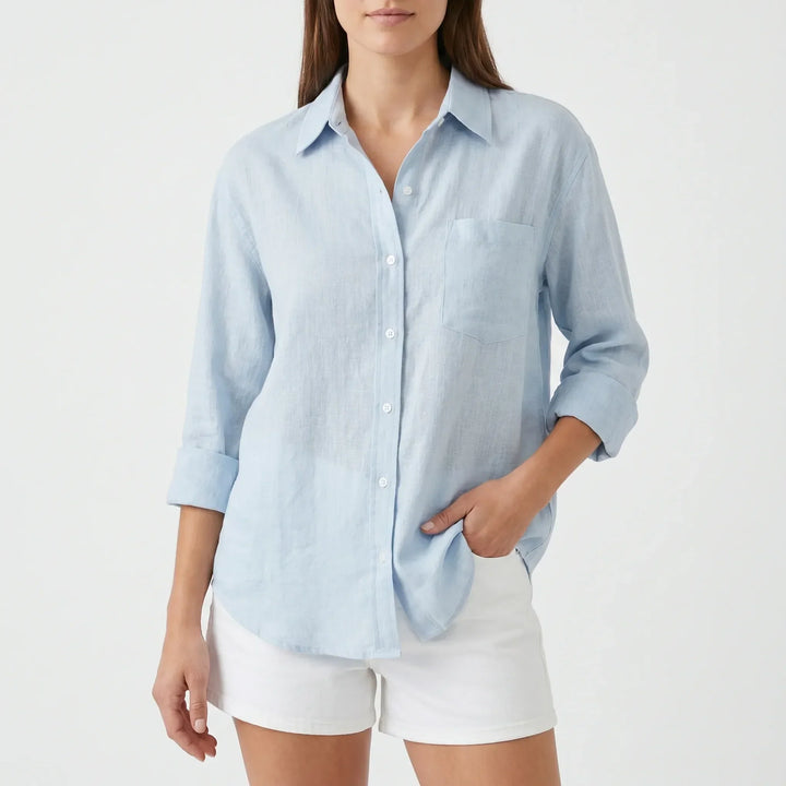 Stylish women's long-sleeve button-up blouse, comfortable for workwear or daily office attire.