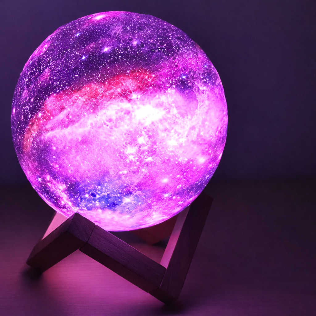 Enchanting lunar glow LED moon lamp with remote control, displaying 16 vibrant colors for ambient bedroom lighting.