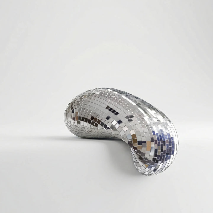 Modern LustraCurl tabletop sculpture; dynamic light art & reflective decor, a unique contemporary gift for home.
