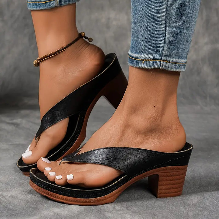 Black orthopedic heeled sandals for women, elegant & comfortable for dressy occasions.