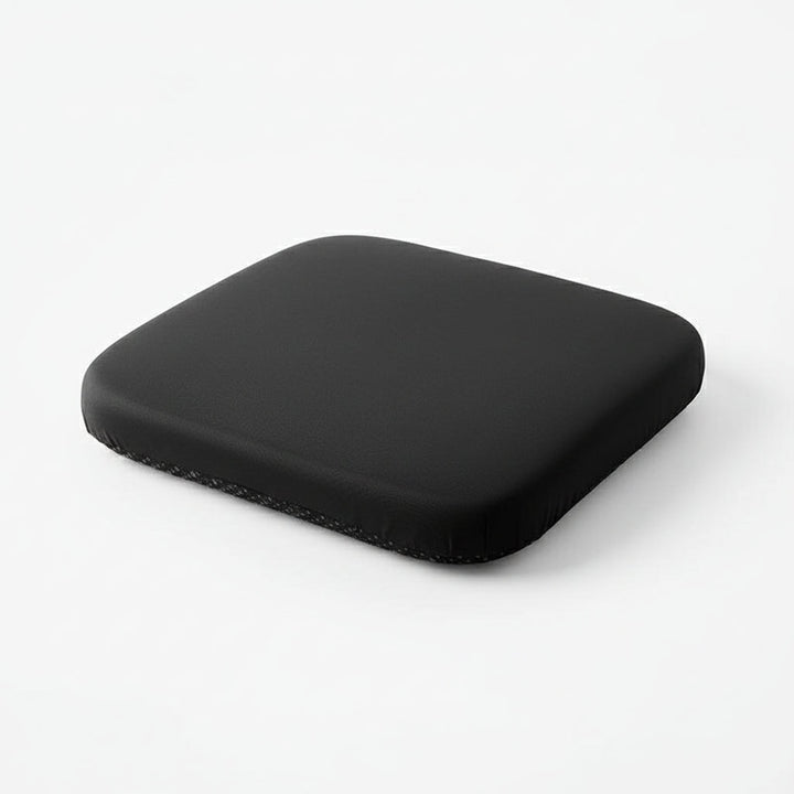 Posture correcting memory foam seat cushion, ergonomic for healthy back alignment & improved office sitting comfort.