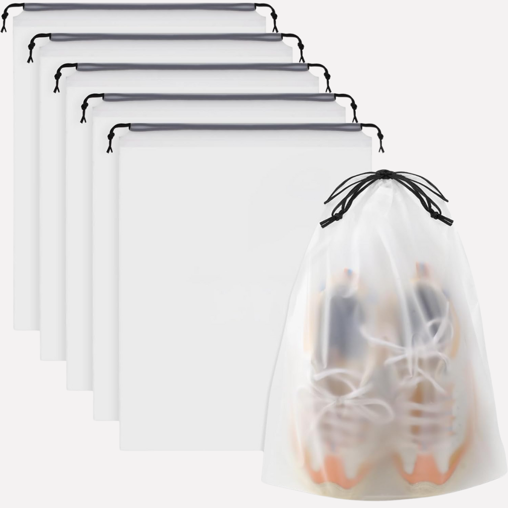 Clear drawstring travel bags for shoe storage, keeping clothes clean in luggage. Set of 5 organizers.