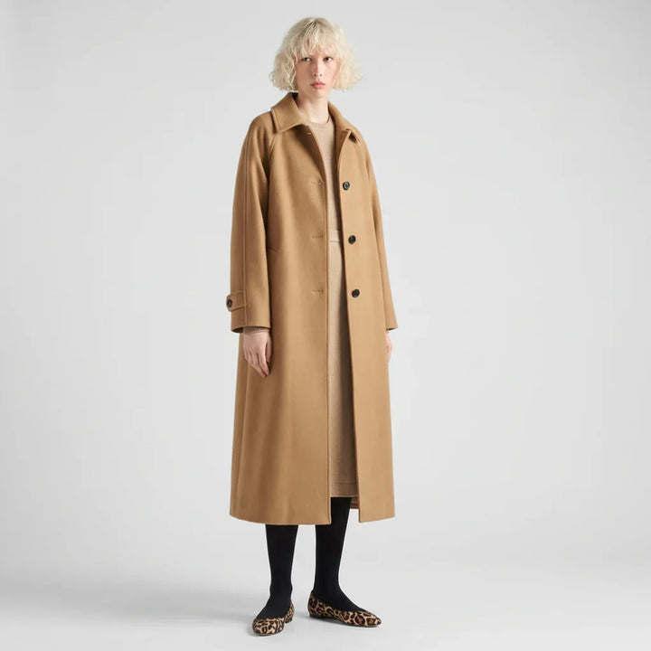 Elegant women's long khaki coat, perfect for fall and winter workwear or formal occasions. Stylish beige outerwear.