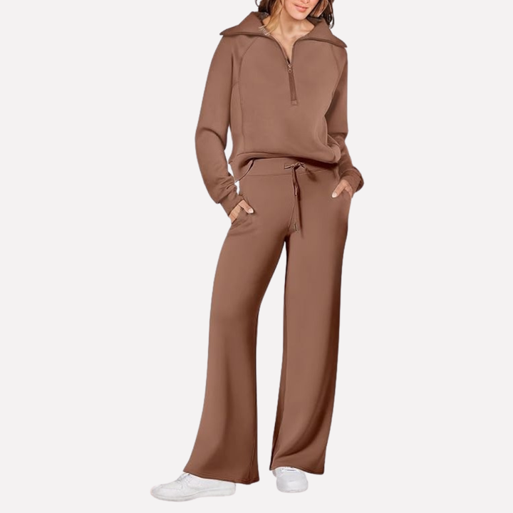Women's fashion travel outfit: elegant top & comfortable wide-leg pants. Perfect matching set for any adventure.