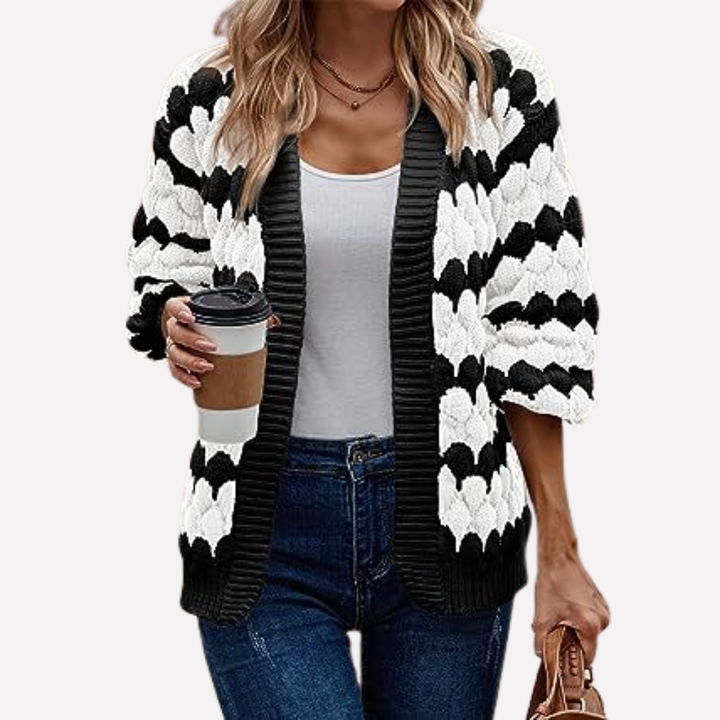 Women's elegant open-front cardigan in a comfortable fit, a versatile long-sleeve layering piece for any look.