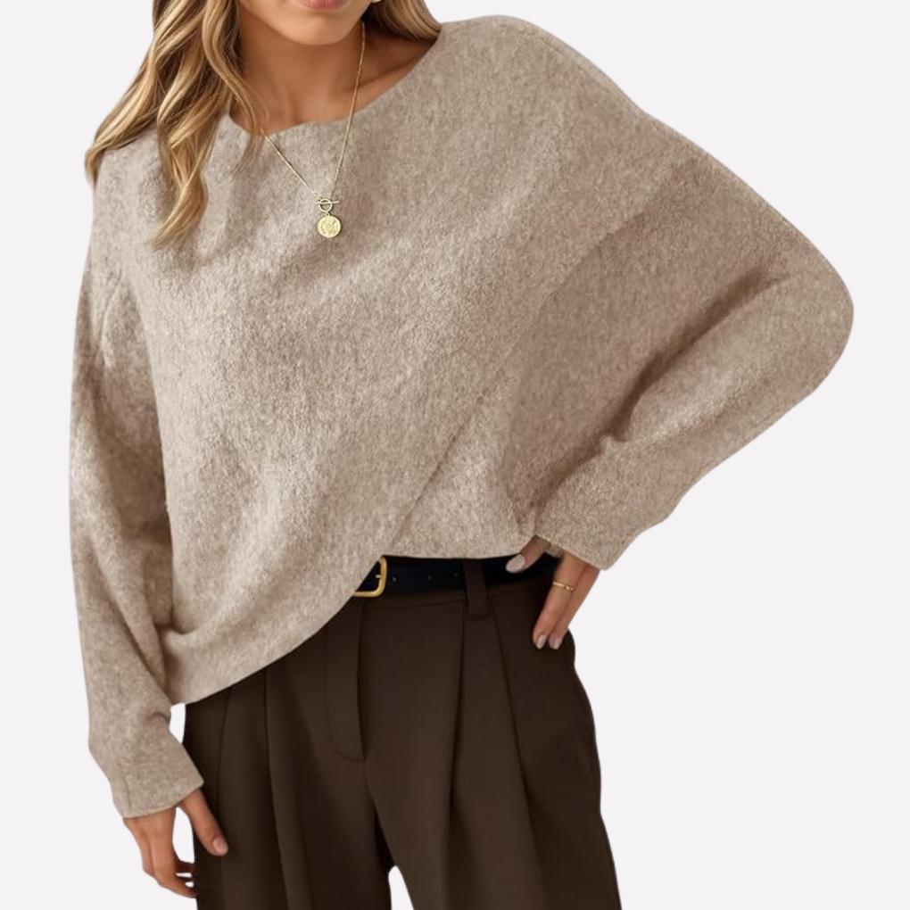 Comfortable women's loose fit oversized batwing sweater. Long sleeve, versatile crew neck for casual autumn style.