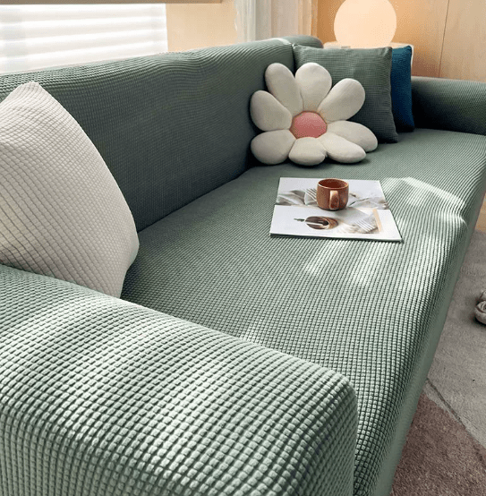 Refresh your living room with a stylish jacquard sofa protector. Non-slip, easy clean furniture cover.
