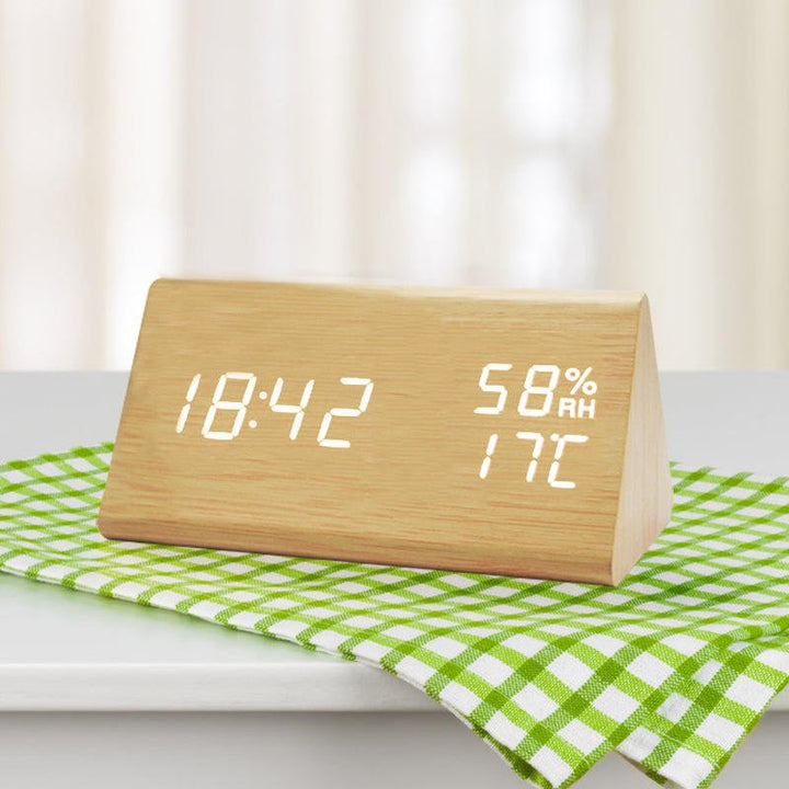Sleek desktop digital clock, wooden finish, with bright LED time & temperature display, ideal for modern home decor.