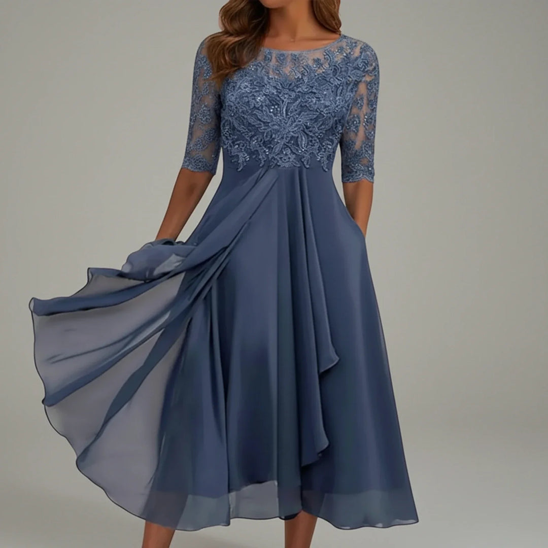 Elegant white lace A-line midi dress with 3/4 sleeves, ideal for wedding guests, cocktail parties, or special occasions.