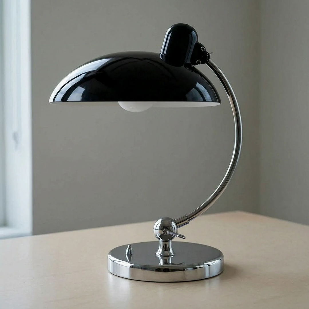 Unisex adjustable arm dome table lamp, ideal for focused task lighting on a desk or office workspace.