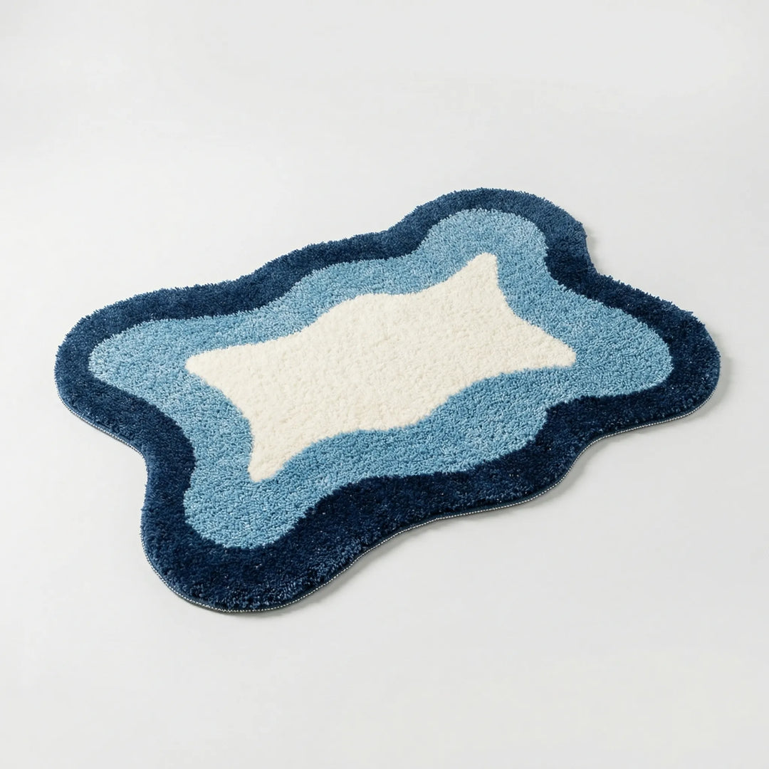 Unisex luxury non-slip bath rug by Flowique. Modern wave pattern offers comfort, absorbency, & safety.