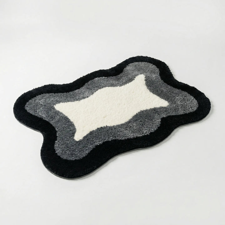 Modern Flowique wave area rug. This luxury non-slip bath mat provides enhanced safety and soft comfort.