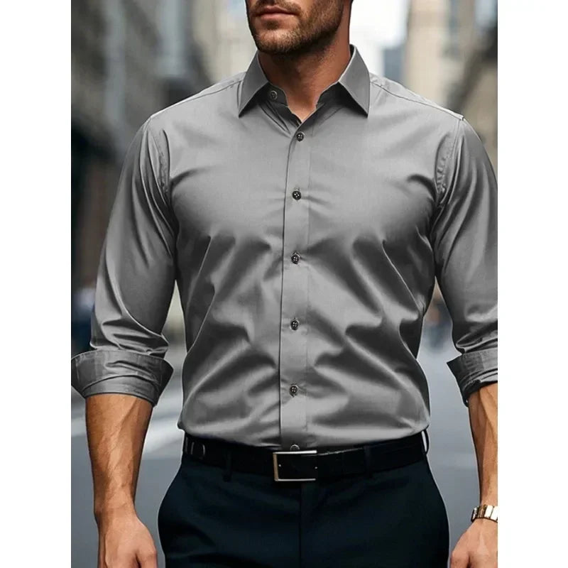 Tailored men's dress shirt with long sleeves and button-down collar, perfect for office or formal events.