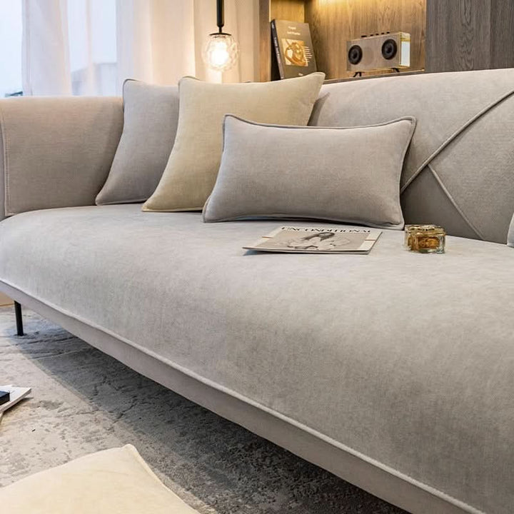 Pet-friendly & washable universal sofa cover, a comfortable couch protector for stylish home decor. Modern design.