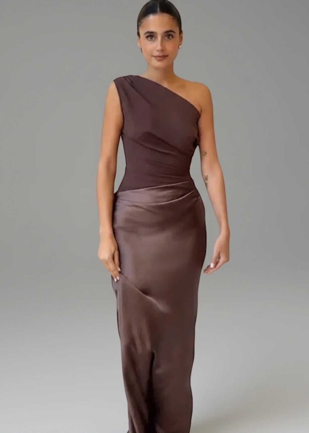 Elegant women's one-shoulder maxi evening dress in a sophisticated column silhouette, perfect for formal events.