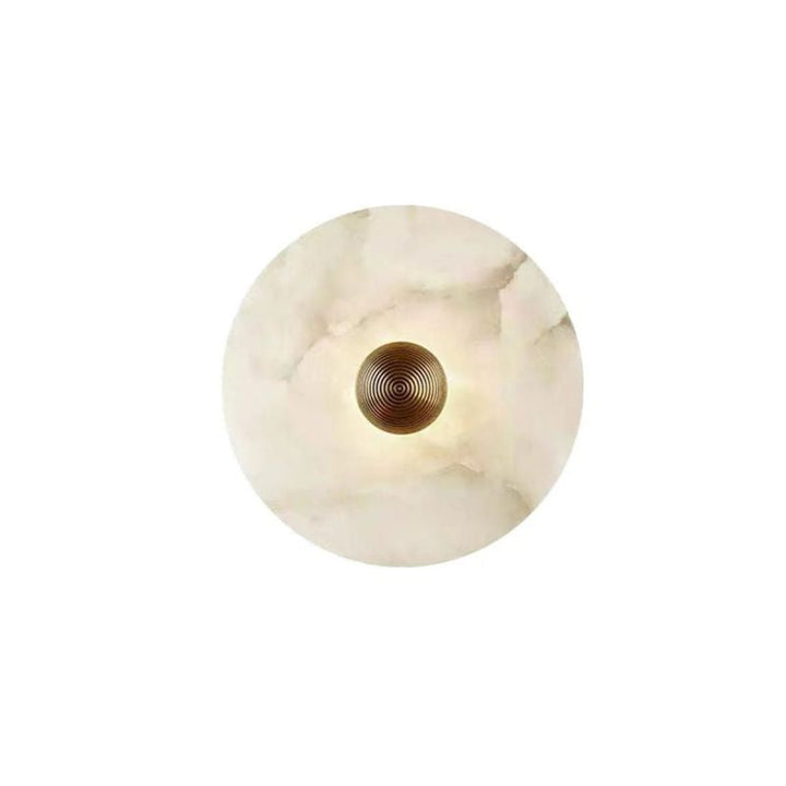 Sleek round brass LED wall light, an alabaster flush mount sconce enhancing any modern luxury interior.