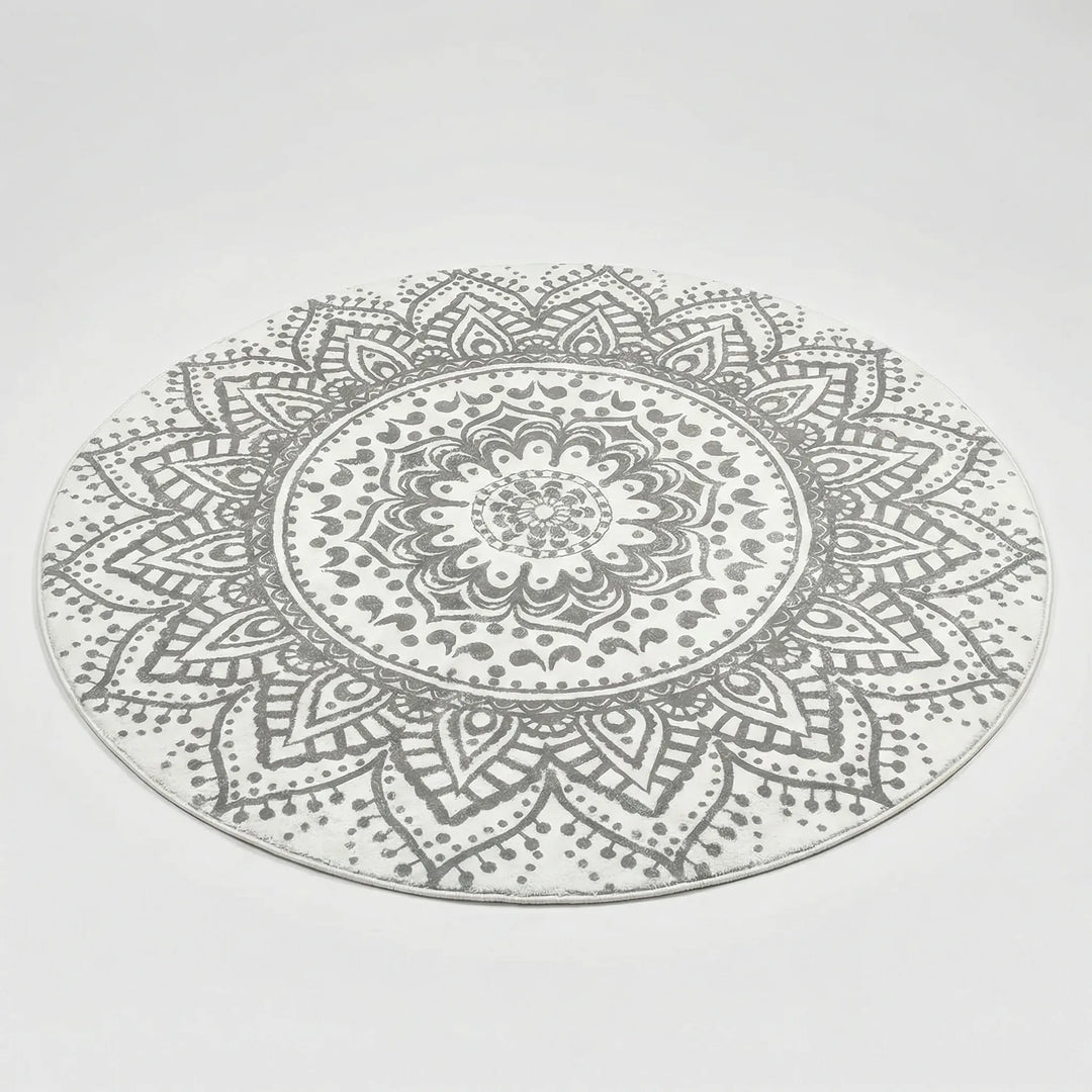 Round bohemian accent rug with waves pattern for living room or bedroom. Non-slip, machine washable home decor.