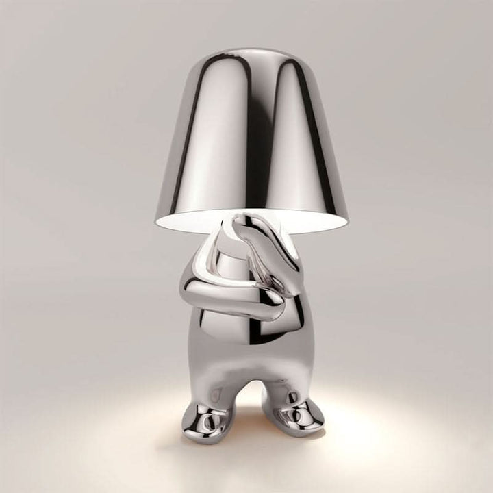 Chic silver dimmable LED desk lamp, perfect for a modern home office or study area.