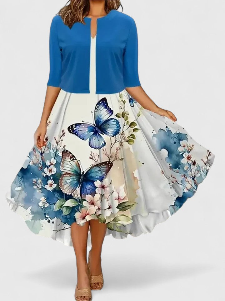 Flowy A-line midi dress for women, featuring a stunning floral print and elegant colorblock. Flattering & comfortable.