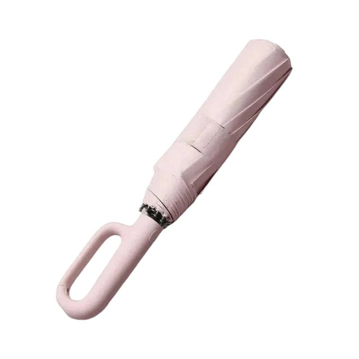Ergonomic handle of automatic travel umbrella, comfortable grip, non-slip, built for windy conditions.