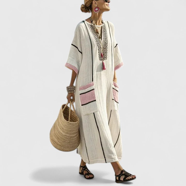 Relaxed fit women's bohemian maxi dress with convenient pockets. Essential summer casual long dress for women's fashion.