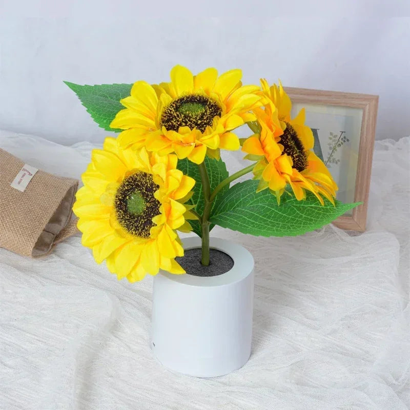 Rechargeable LED sunflower night light table lamp. Perfect for bedroom or home decor, providing soft ambient light.