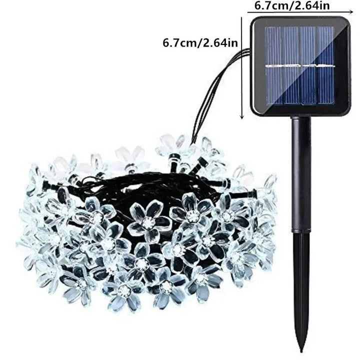 Vibrant 16.4 ft solar blossom LED string lights, enhancing any outdoor garden or patio decor.