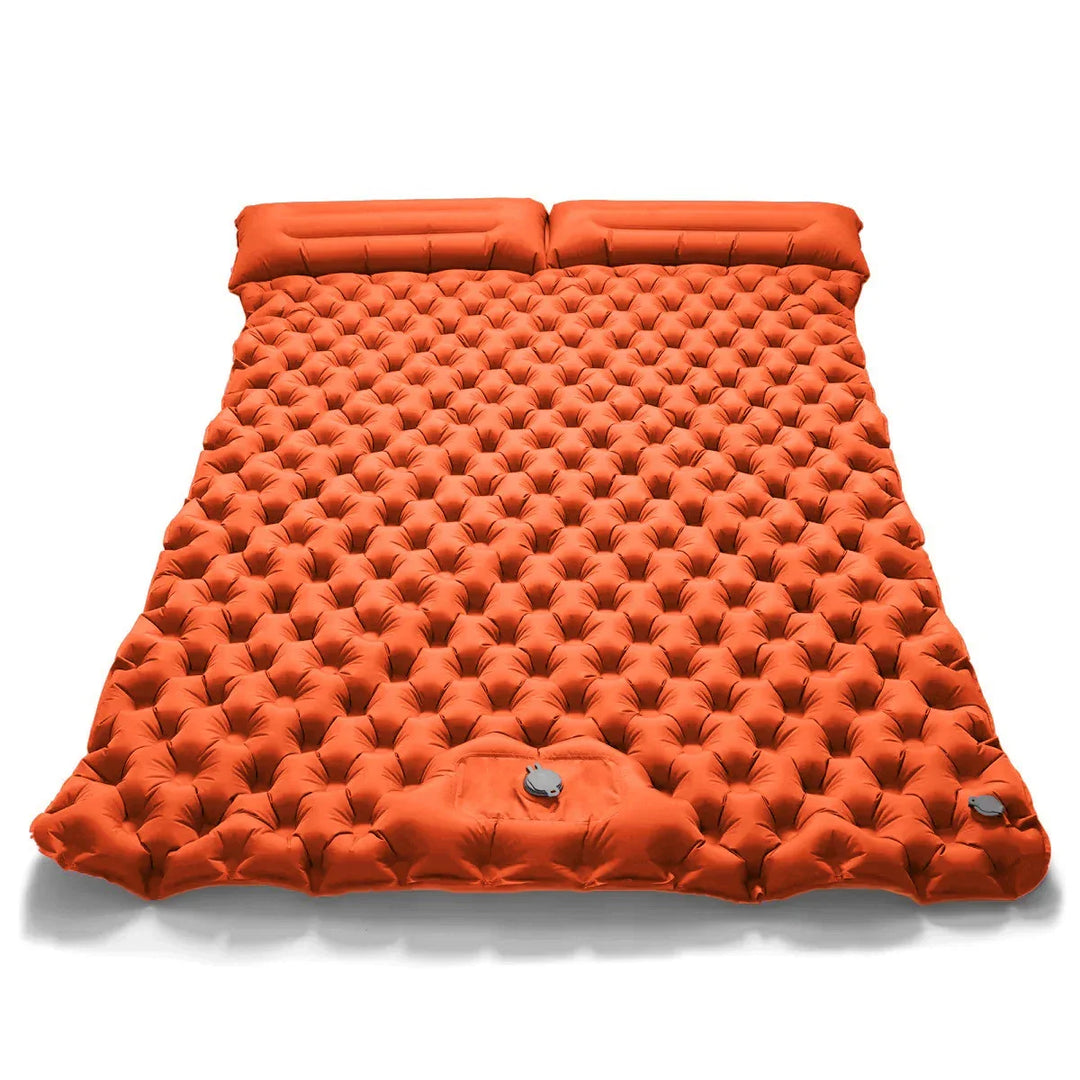Soft, comfortable surface of a dual camping air bed. Premium inflatable mattress for restful outdoor sleep.