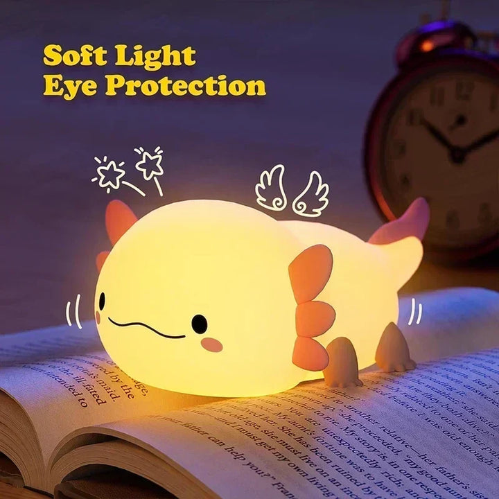 Portable rechargeable silicone night light for kids, featuring soft LED light & easy touch control for bedtime.