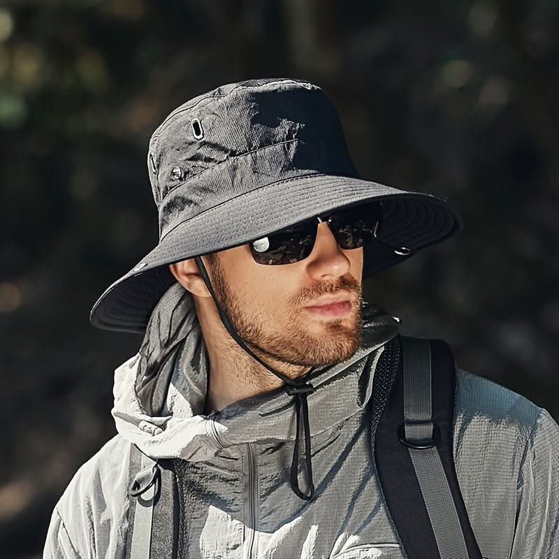 Unisex breathable sun hat with wide brim for ultimate UV protection, perfect for outdoor activities like hiking & fishing.