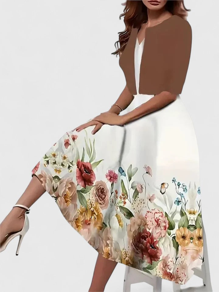 Elegant women's A-line midi dress with vibrant floral print, chic colorblock design & flattering flowy fit for spring/summer.