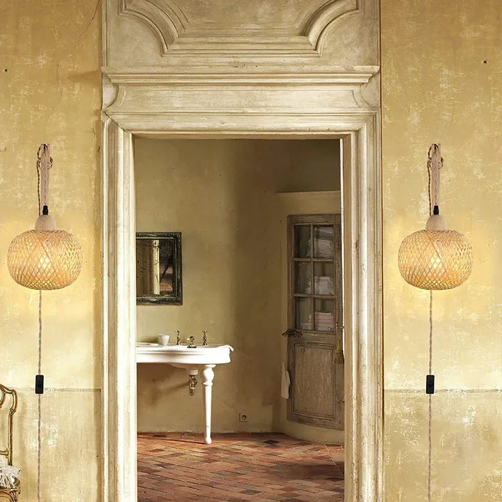 Handcrafted natural rattan wall lantern, a stylish bohemian light fixture for modern homes.