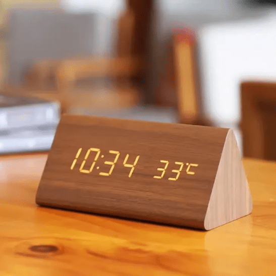 Voice-controlled wooden LED alarm clock, perfect for modern homes, offices, or bedrooms.