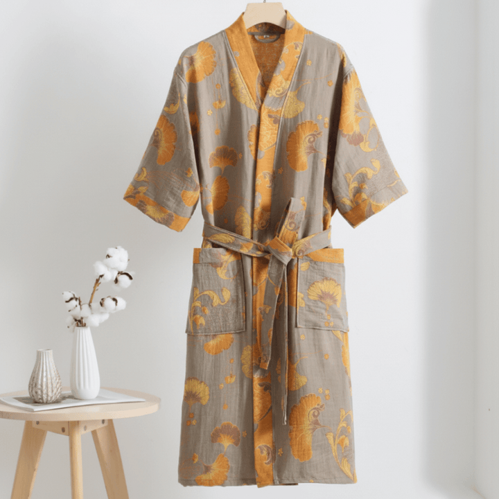 Indulge in comfort with this lightweight unisex kimono bathrobe, perfect for relaxing at home or spa.