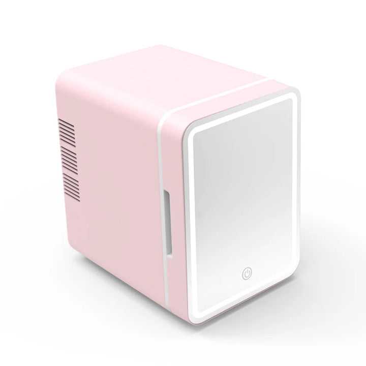 Pink 4L mini beauty fridge with LED light, a portable cosmetic chiller & skincare storage. Vanity essential.