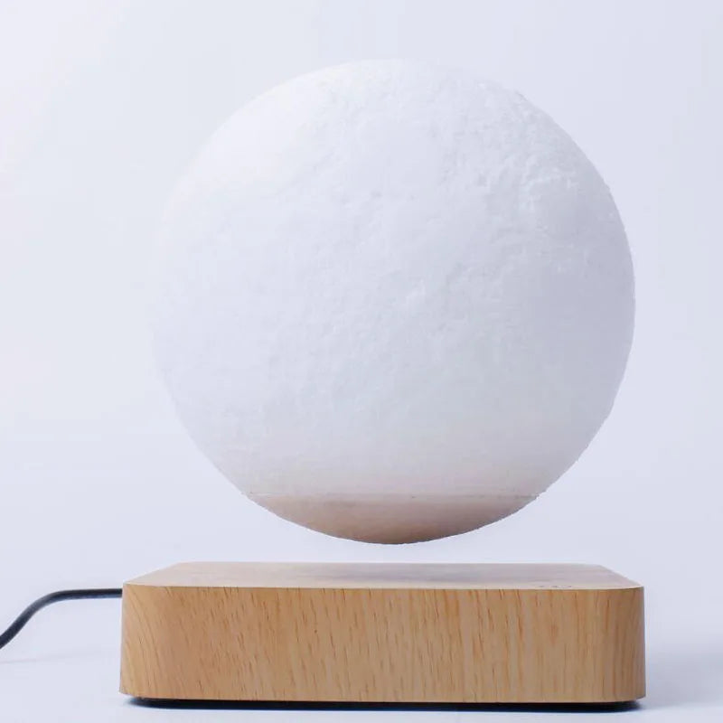 Innovative magnetic levitating moon lamp, LED night light for futuristic home decor & ambient glow.