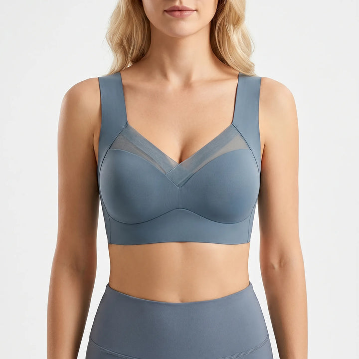 Chic women's push-up bra with elegant mesh panel & wide straps. Offers seamless, invisible fit.