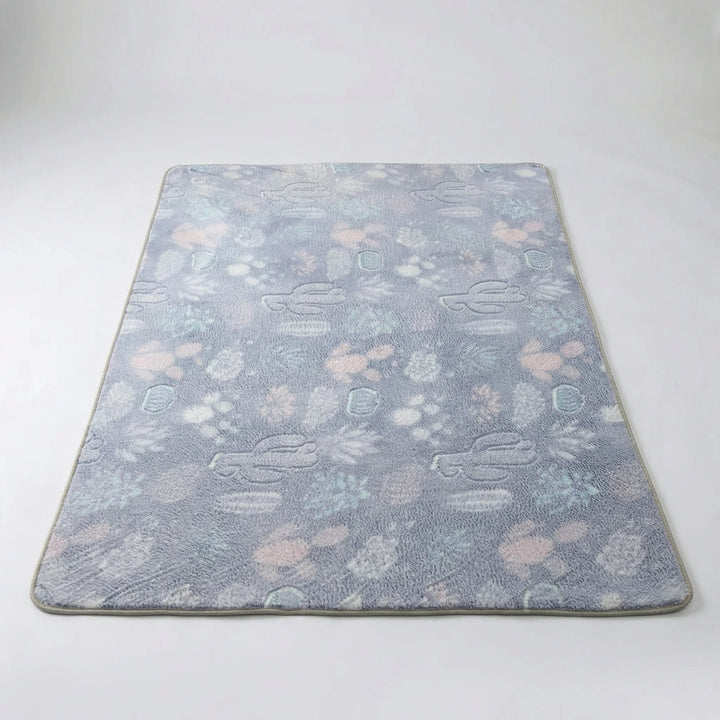 Durable Flowique wave pattern area rug for kids' playroom. Soft, easy care & whimsical design.