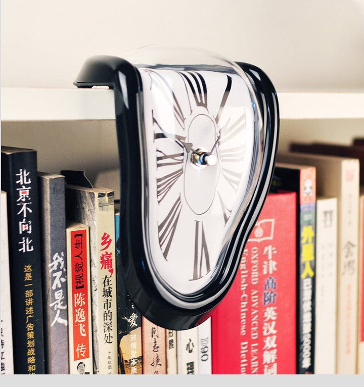 Elegant gold sculptural art clock, a modern and unique accent for any room.