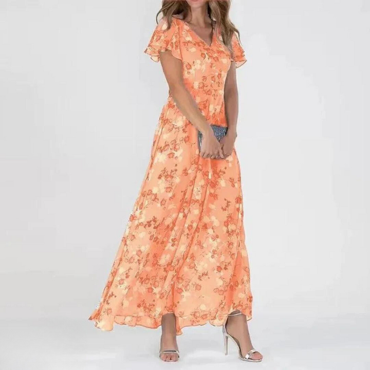 Chic women's romantic floral maxi dress, V-neck, flutter sleeves. Perfect flowy party & wedding guest dress.
