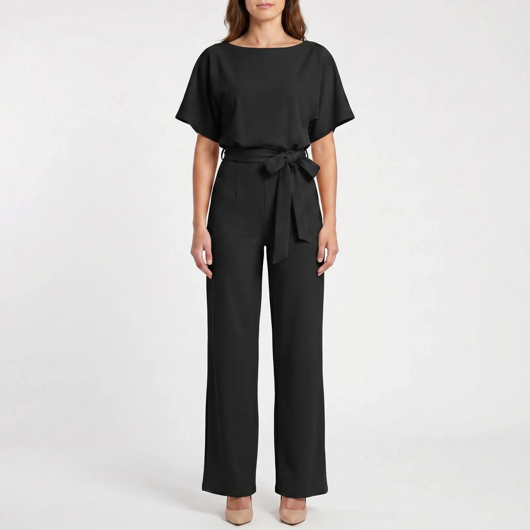 Chic belted wide-leg jumpsuit for women with comfortable batwing short sleeves. Ideal for evening or casual wear.