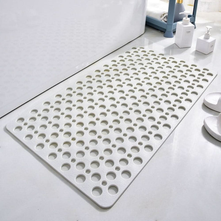 Hygienic anti-slip shower mat with powerful suction cups prevents slips. A durable, washable floor mat for bathroom safety.