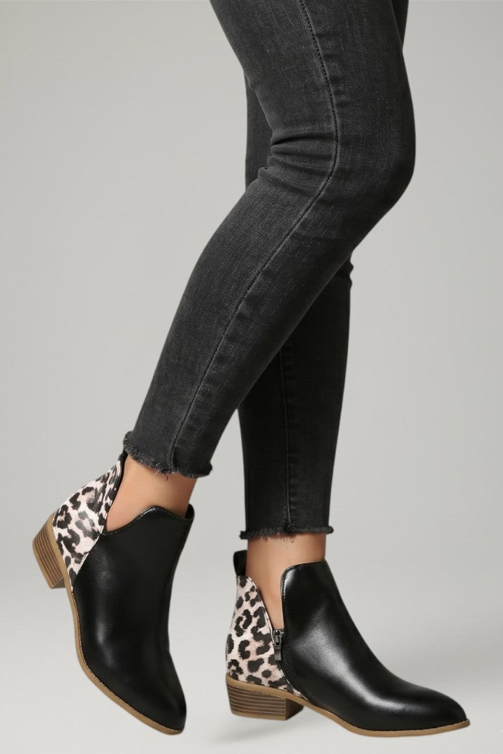 Comfortable women's everyday ankle boots; easy side zipper access & supportive low heel design.